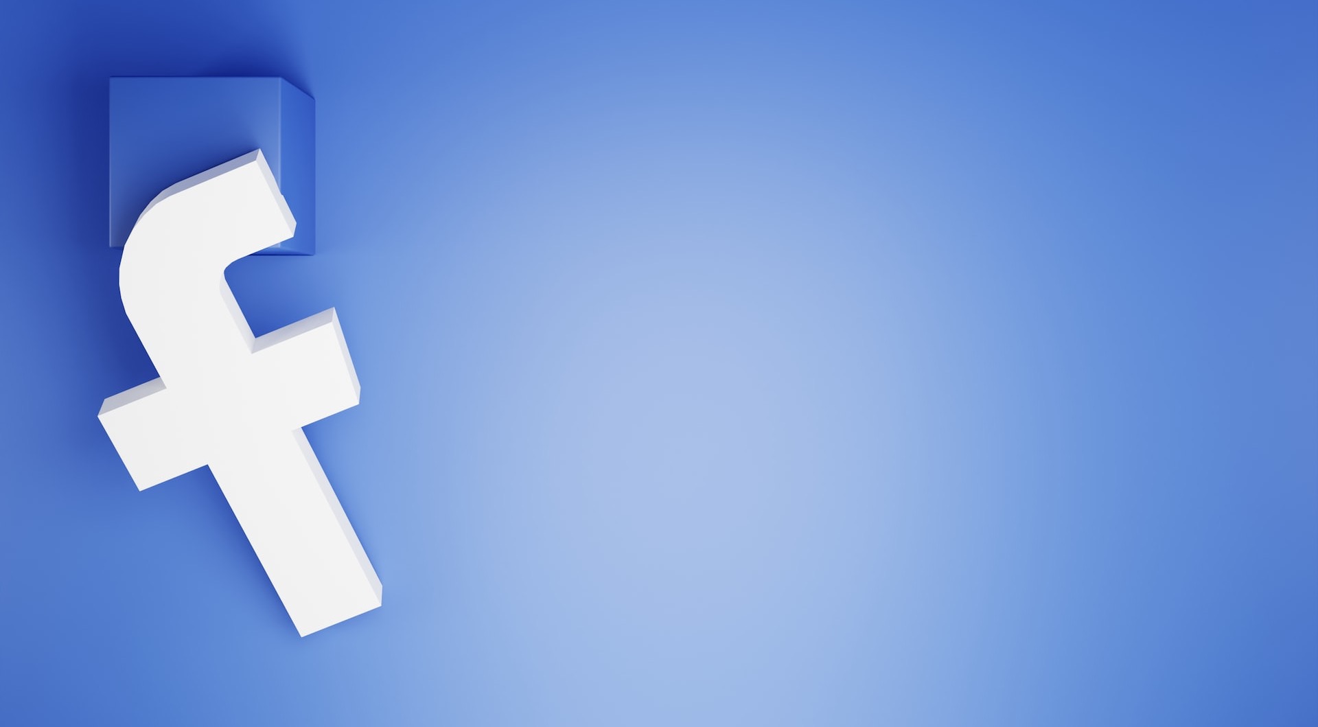 a white facebook logo on a blue background